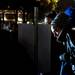 People glance at a photograph of President Obama on Tuesday. Daniel Brenner I AnnArbor.com